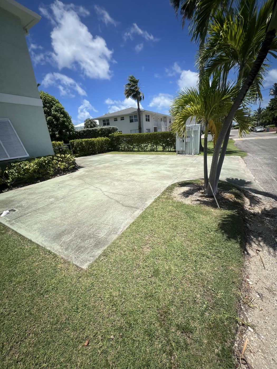Duplex driveway clean — Soft wash, by Cayman Clean & Blast, Grand Cayman
