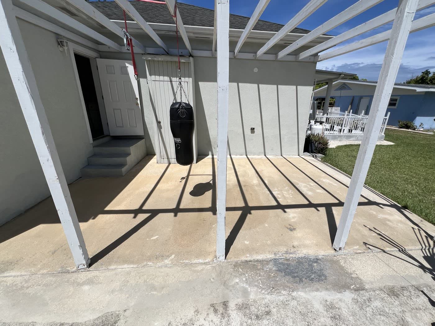 Carport slab — after, cleaned by Cayman Clean & Blast, Grand Cayman